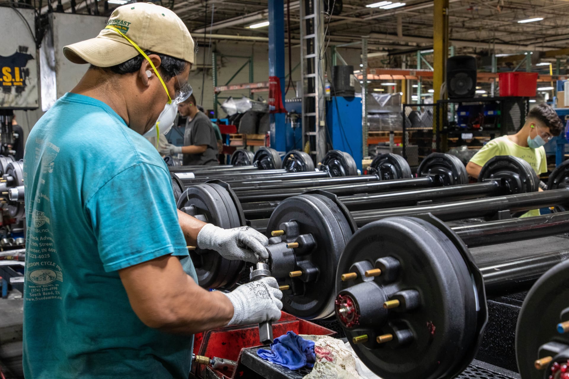 Worker Building Trailer Axles Brake Hub